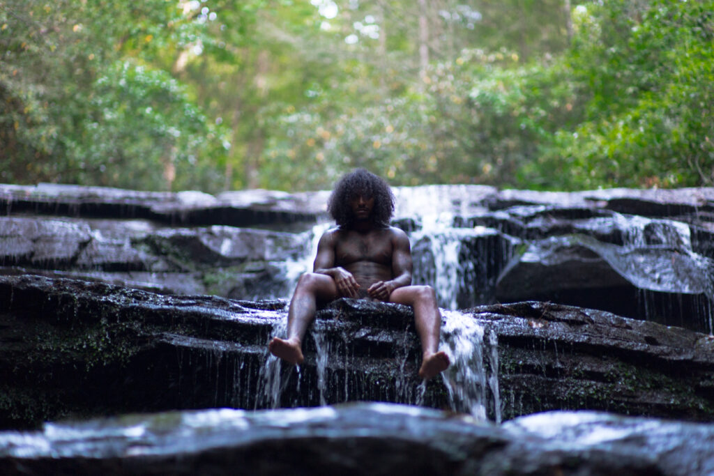 R&B singer Lloyd poses in nature for his TRU album packaging 