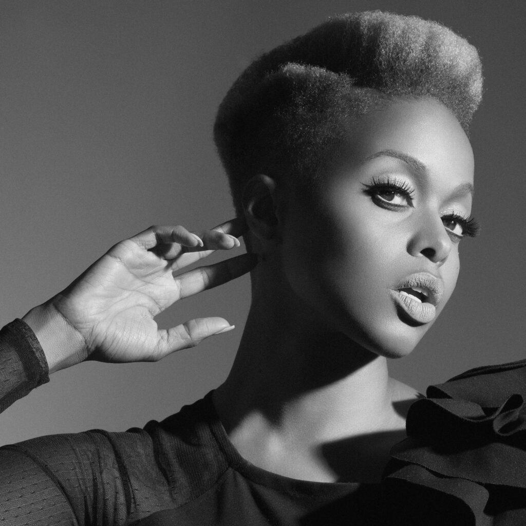 A black and white photo of R&B singer Chrisette Michele pictured from her Epiphany era in 2009